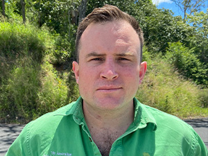 Portrait of John McLean Bennett in green shirt