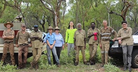 Group of volunteers gathered in the bush